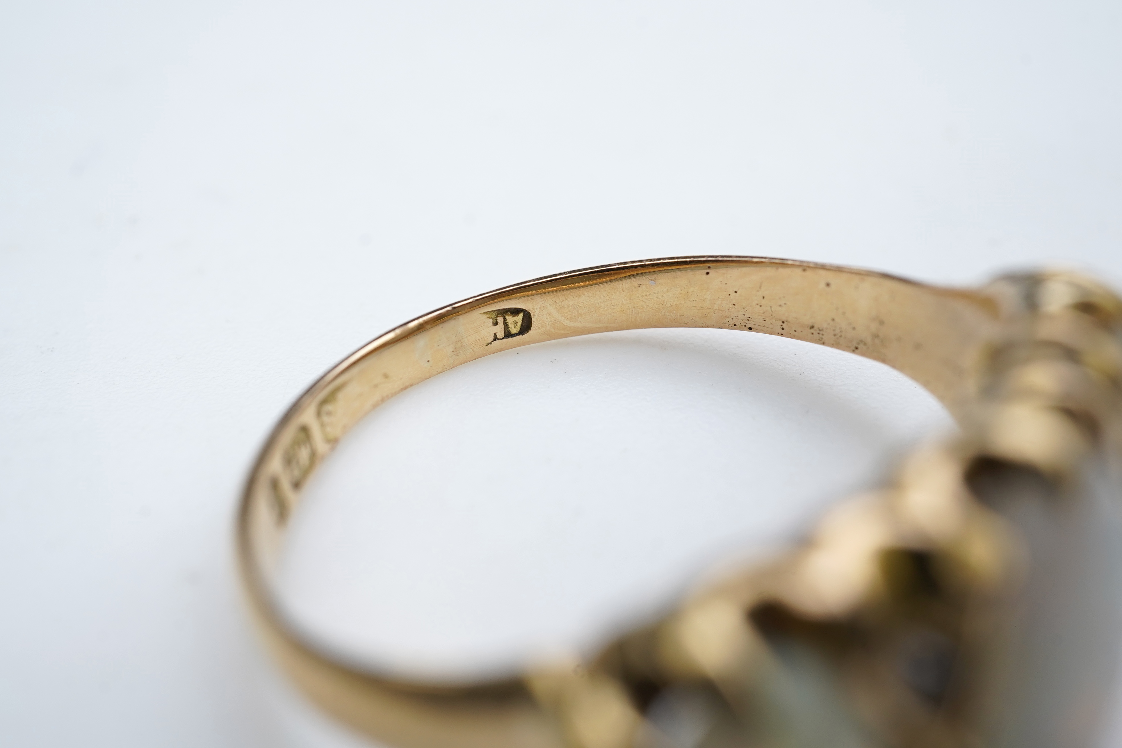 A Victorian 18ct gold and opal ring, circa 1898